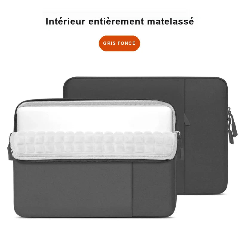 Housse gris foncé pour ordinateur portable ouverte, montrant sa doublure intérieure matelassée blanche.