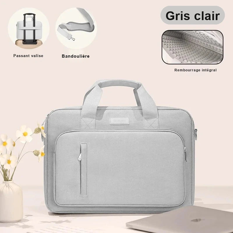Sacoche gris clair pour ordinateur portable vue de face, avec ses vignettes de detail : passant valise, bandouliere et rembourrage interieur.