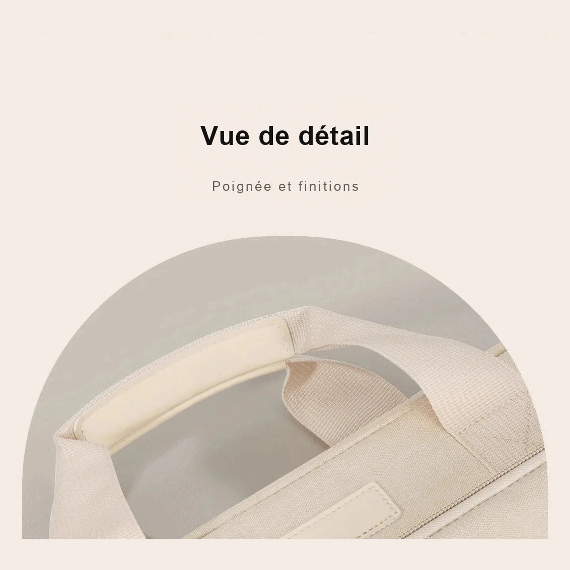 Gros plan sur la poignée et les sangles de portage d'une sacoche à ordinateur en toile beige.