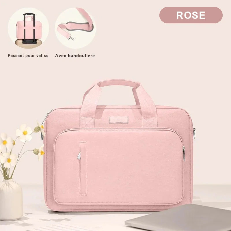 Sacoche 16 pouces en tissu rose posée sur un bureau, avec deux vignettes montrant le passant pour valise et la bandoulière.